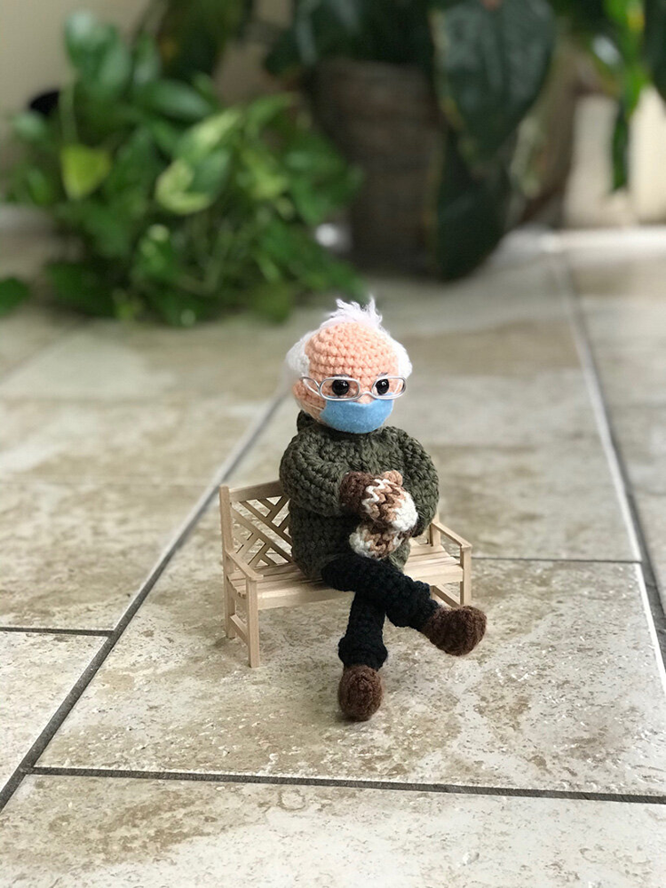 A beautiful crochet doll of Bernie Sanders wrapped up in mittens